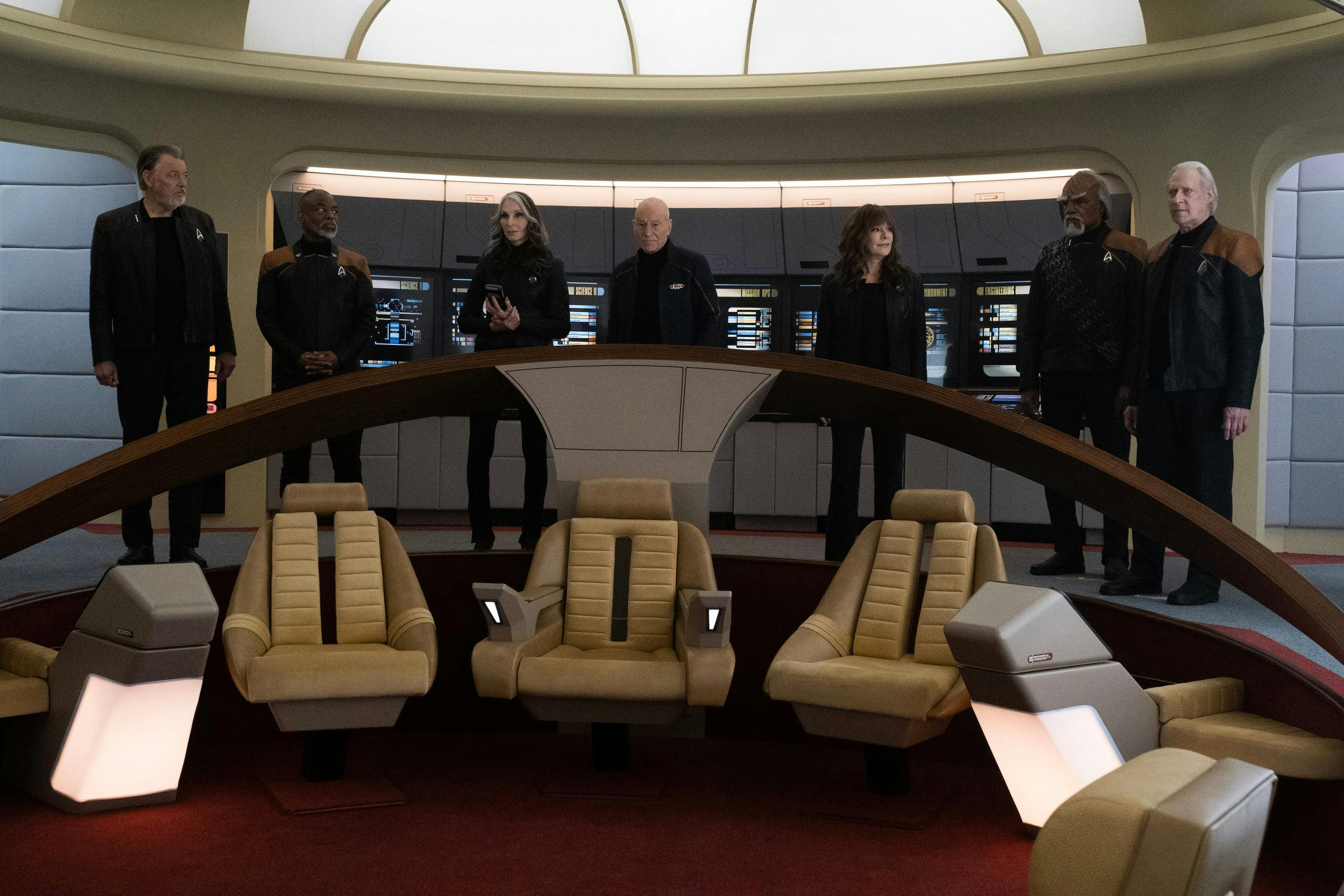 Riker, Geordi, Beverly, Picard, Deanna, Worf, and Data stand on the Bridge of the reconstructed Enterprise-D in 'Vox'