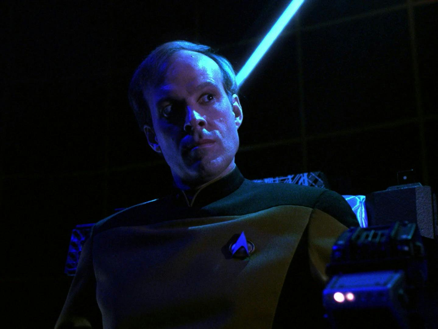 A pensive Reginald Barclay looks to the side in Star Trek: The Next Generation - The Nth Degree