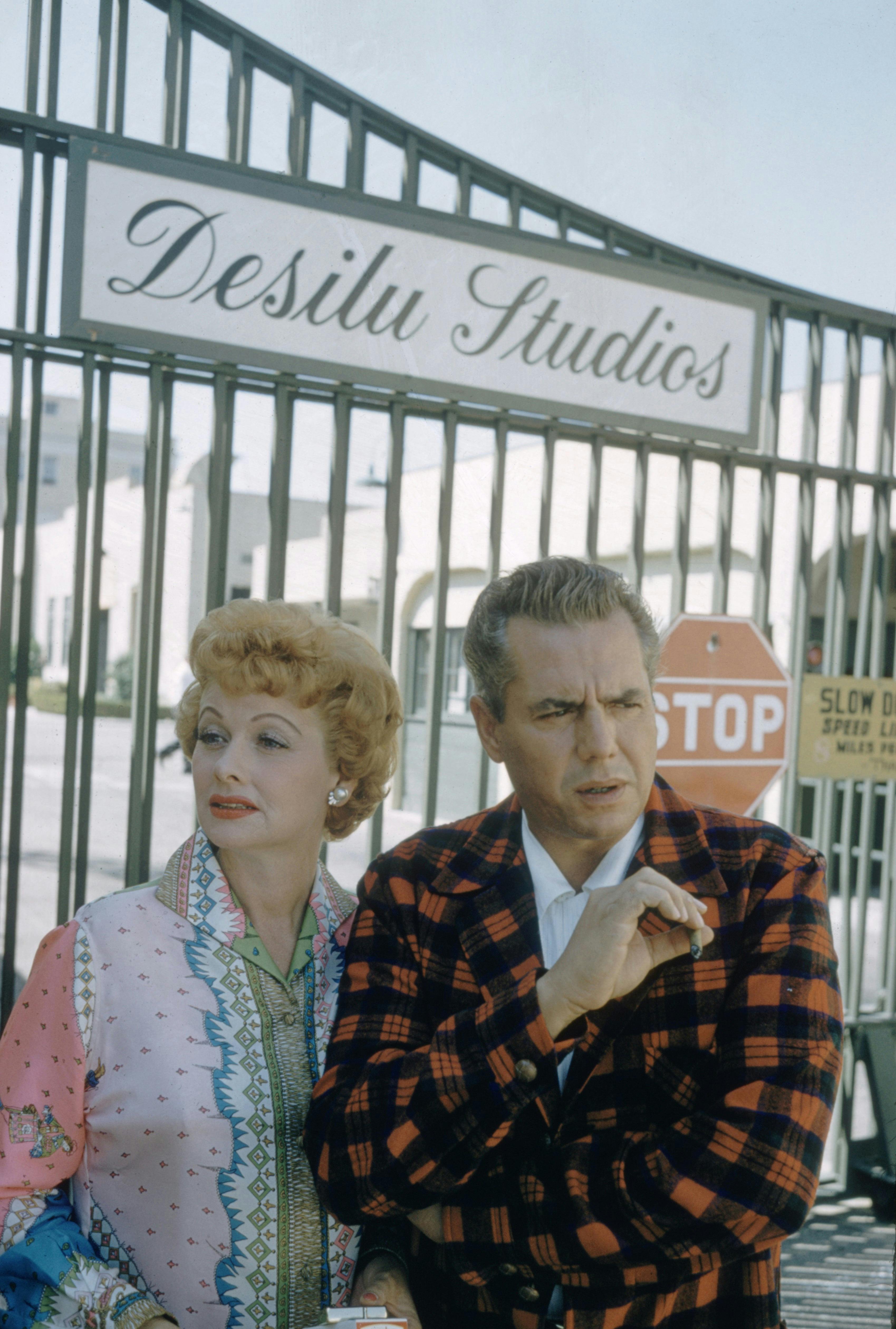 Lucille Ball and Desi Arnaz (pictured smoking) in front of Desilu Studios