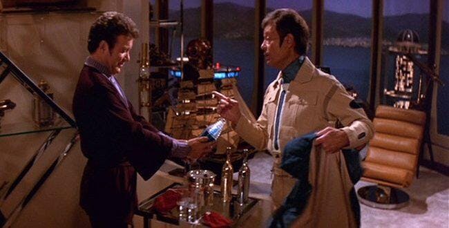 Kirk inspects McCoy's bottle of Romulan Ale in Star Trek II: Wrath of Khan