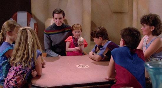 Wesley Crusher takes cares of the young children on the Enterprise after they're kidnapped by the Aldean society.