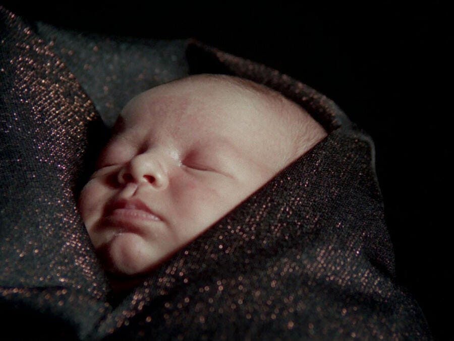 A bundled baby in 'Friday's Child'