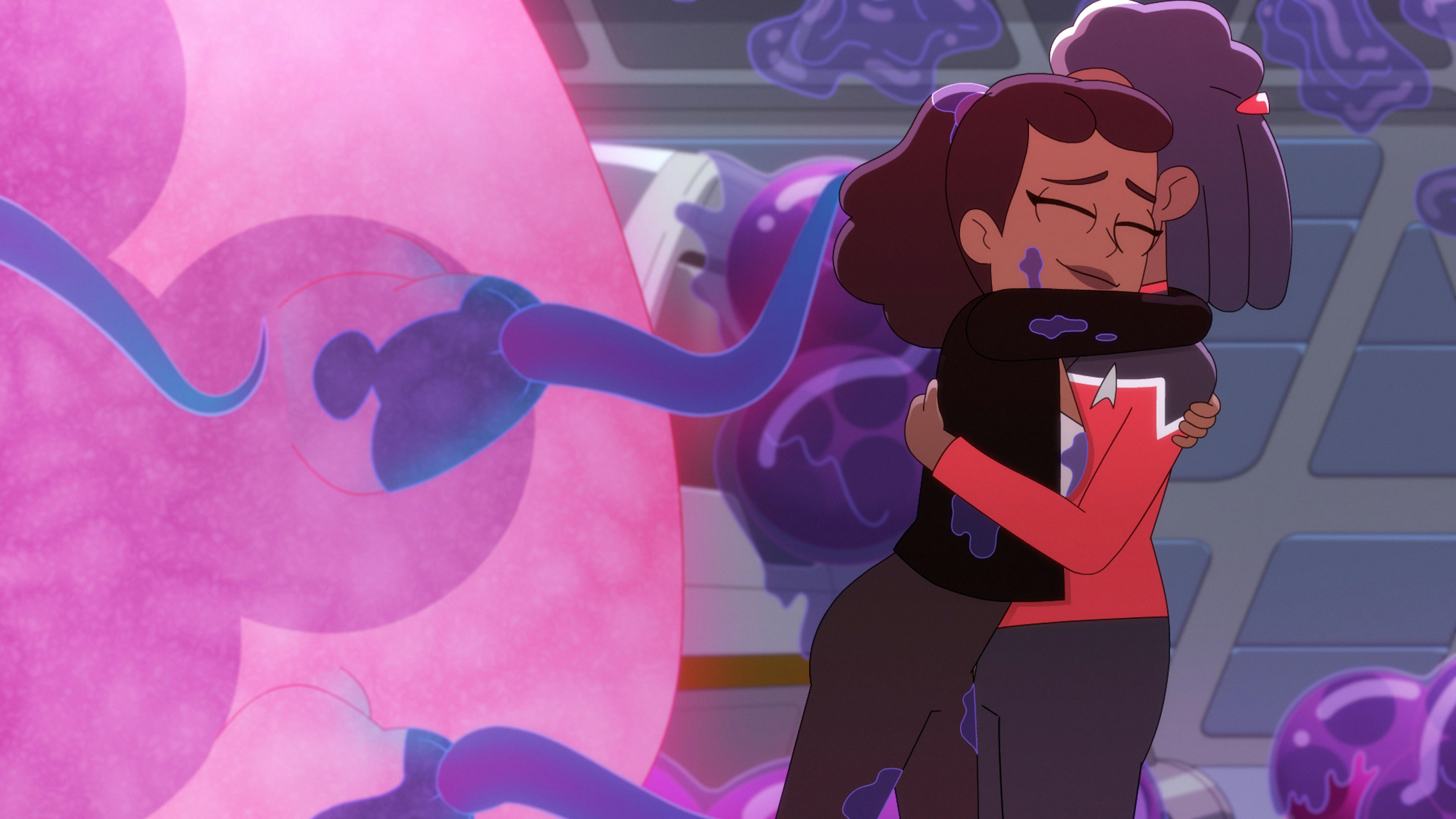 Mariner embraces her mother, Captain Freeman.