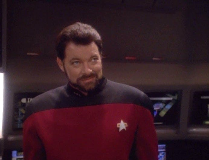 Thomas Riker smirks at Kira.