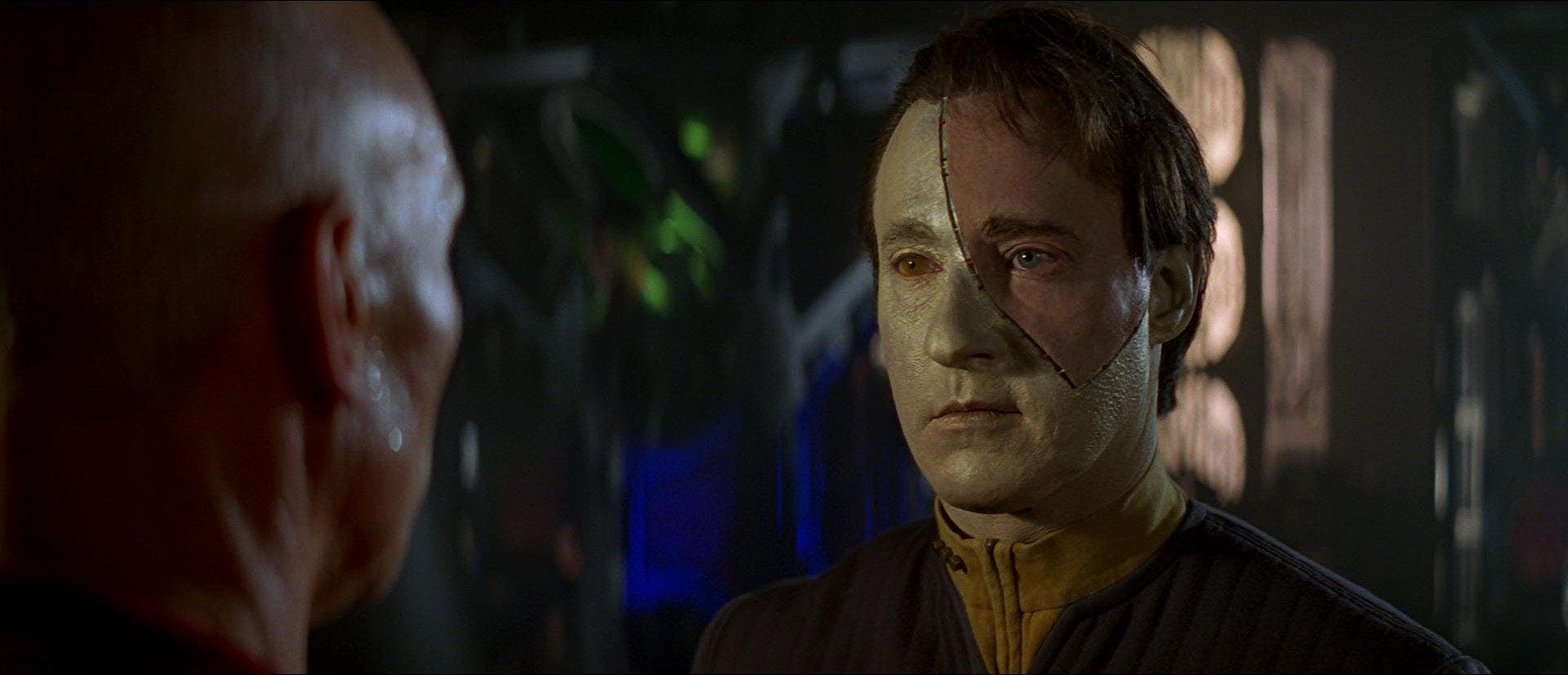 Jean-Luc Picard stands face-to-face with Data who was tempted by the Borg Queen's offer of human skin in Star Trek: First Contact