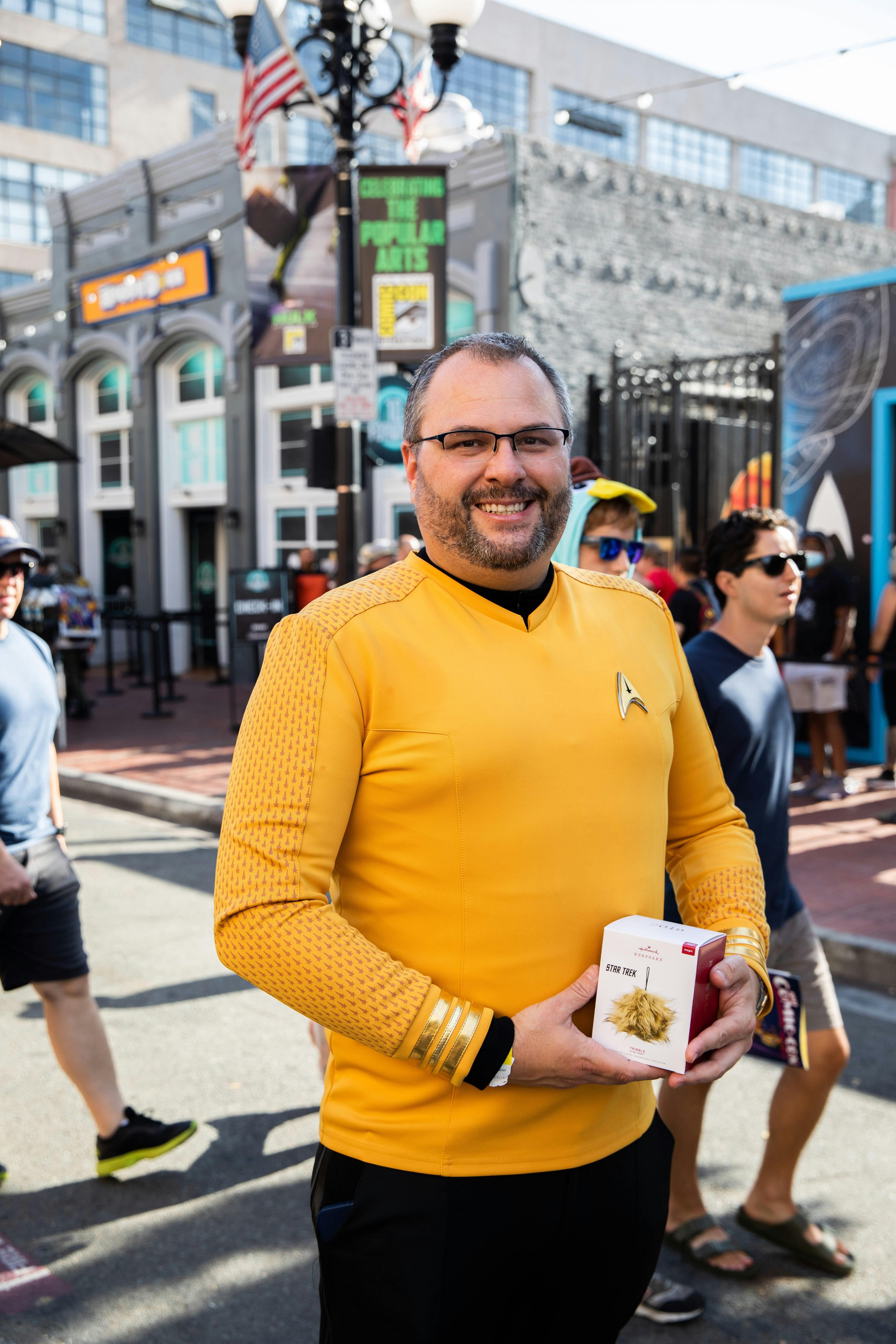 A fan poses in a TOS uniform.
