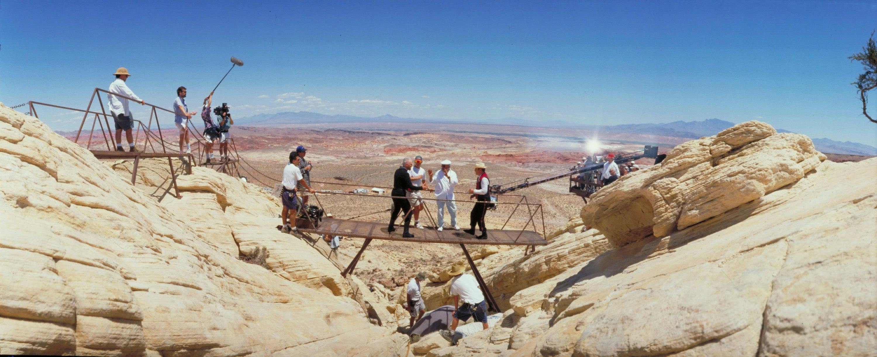 Wide shot of the fight scene featuring Macolm McDowell and William Shatner, various crew and gear, on the set of Star Trek Generations