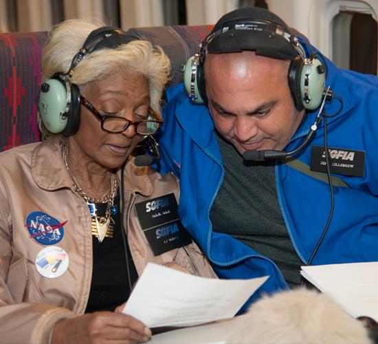 During the Sept. 15 flight, Nichelle Nichols, left, and Jeffrey Killebrew, teacher at the New Mexico School for the Blind and Visually Impaired, discuss wording for the message Nichols was going to send from the stratosphere to the school’s students.