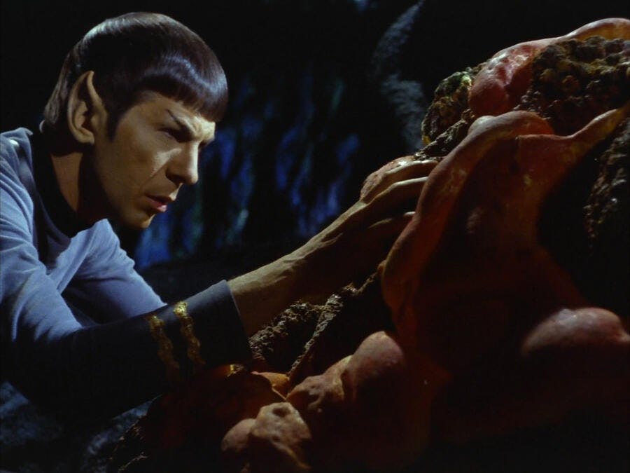 Spock mind melds with the Horta.