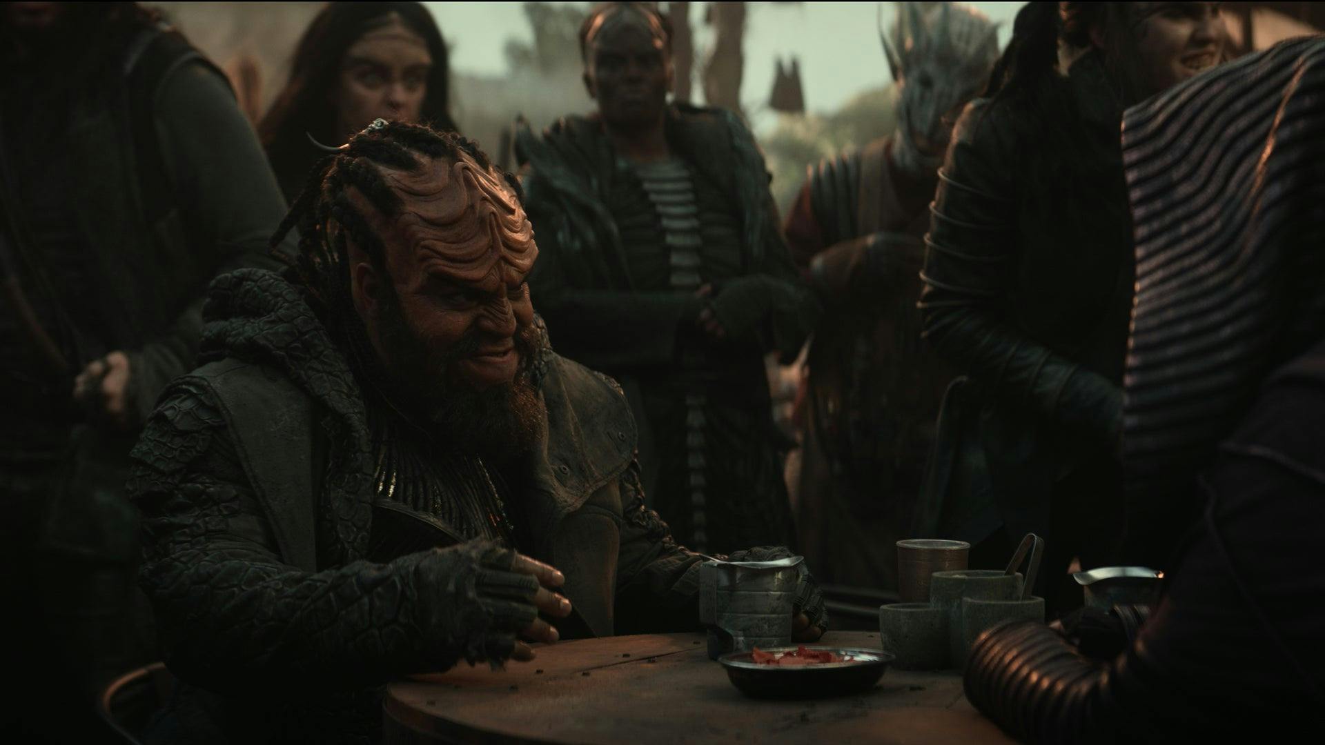 Klingon Kr'Dogh and La'An try to drink each other under the table with bloodwine in 'The Broken Circle'