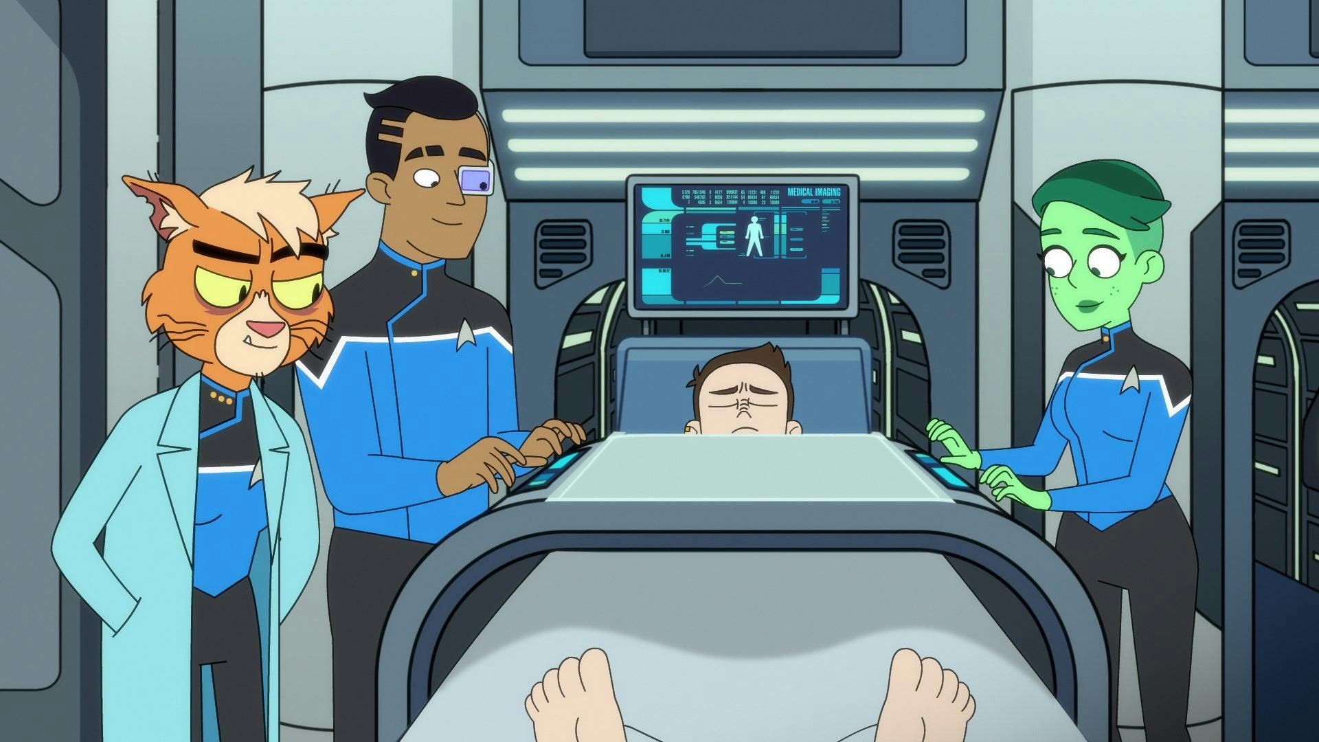 In Sickbay, Tendi monitors a patient in the bio-bed alongside Rutherford and Dr. T'Ana in 'Envoys'