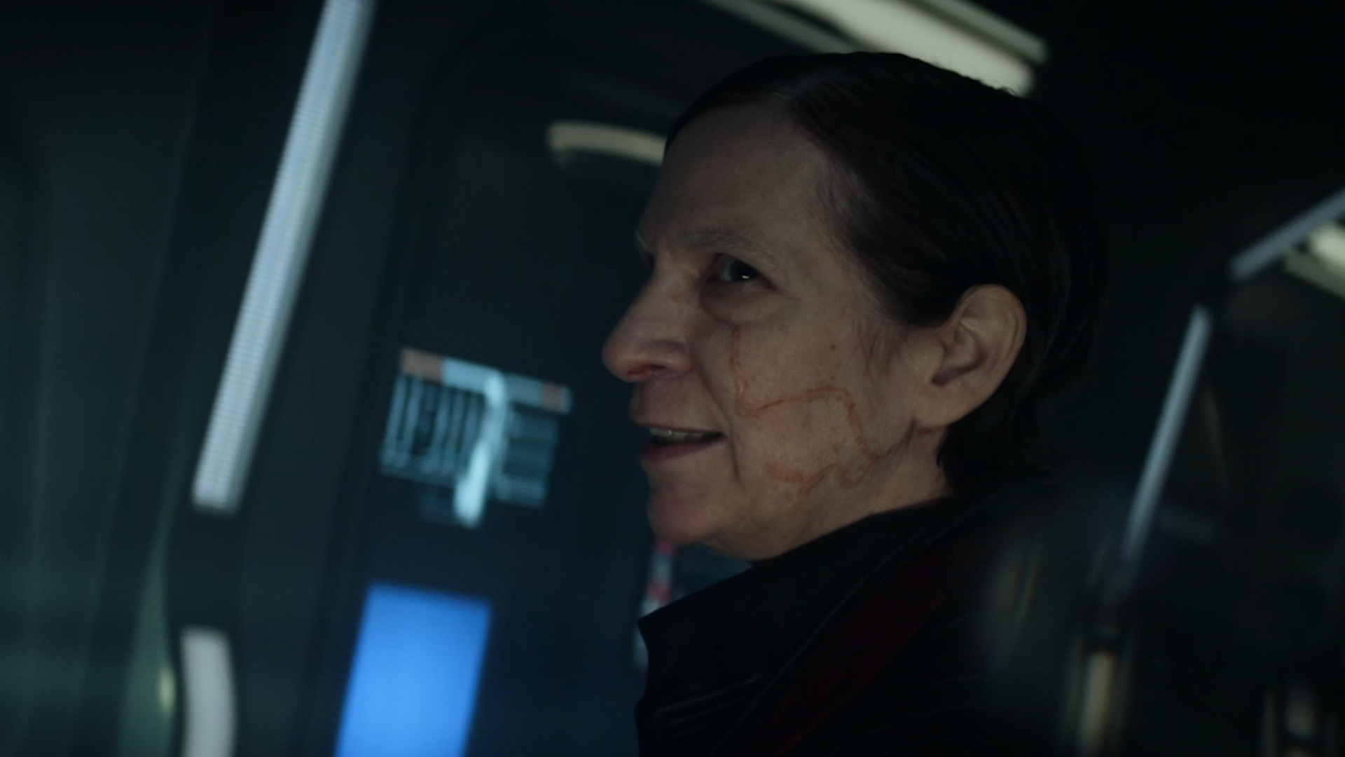 Side profile of the Changeling Vadic in her solid form