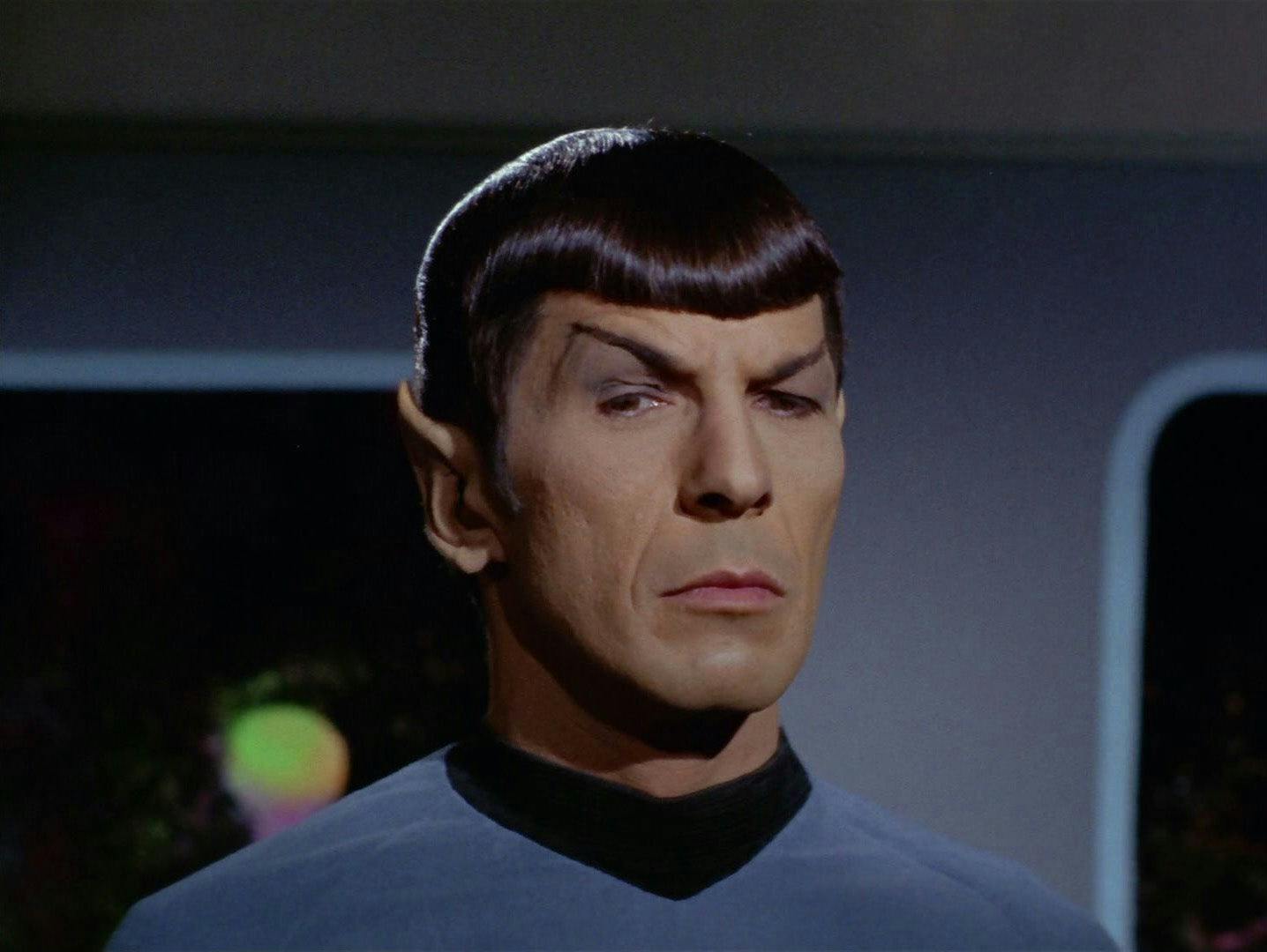 Mr. Spock arches an eyebrow on the bridge of the U.S.S. Enterprise.