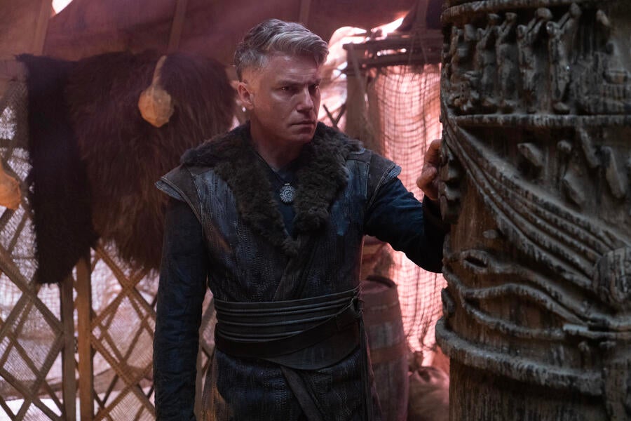 Pike touches a carved wooden pillar on Rigel VII in 'Among the Lotus Eaters'