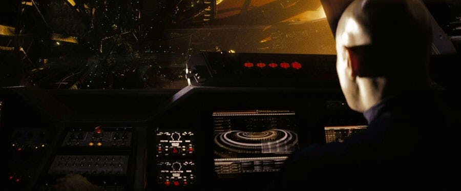 Captain Robau pilots a shuttlecraft towards the Narada in Star Trek (2009)