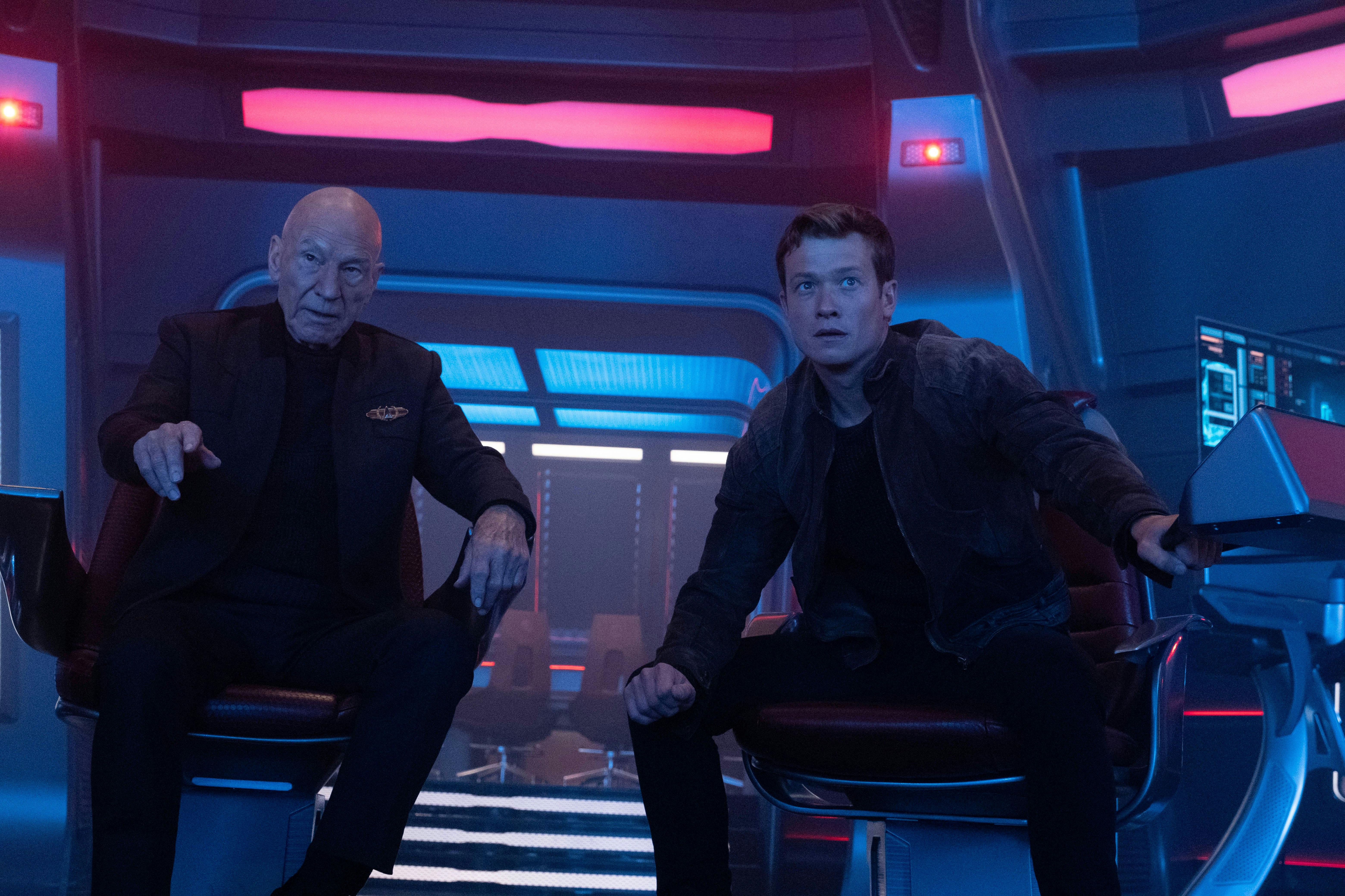 Jean-Luc Picard and Jack Crusher sit on the bridge of the Titan and look ahead