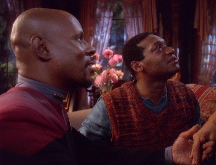 Ben Sisko sits besides an older Jake Sisko in 'The Visitor'