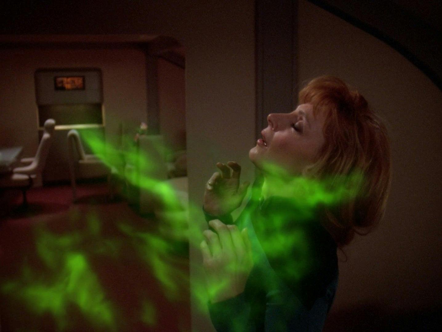 Dr. Beverly Crusher is overtaken by a ghost-like entity in 'Sub Rosa'