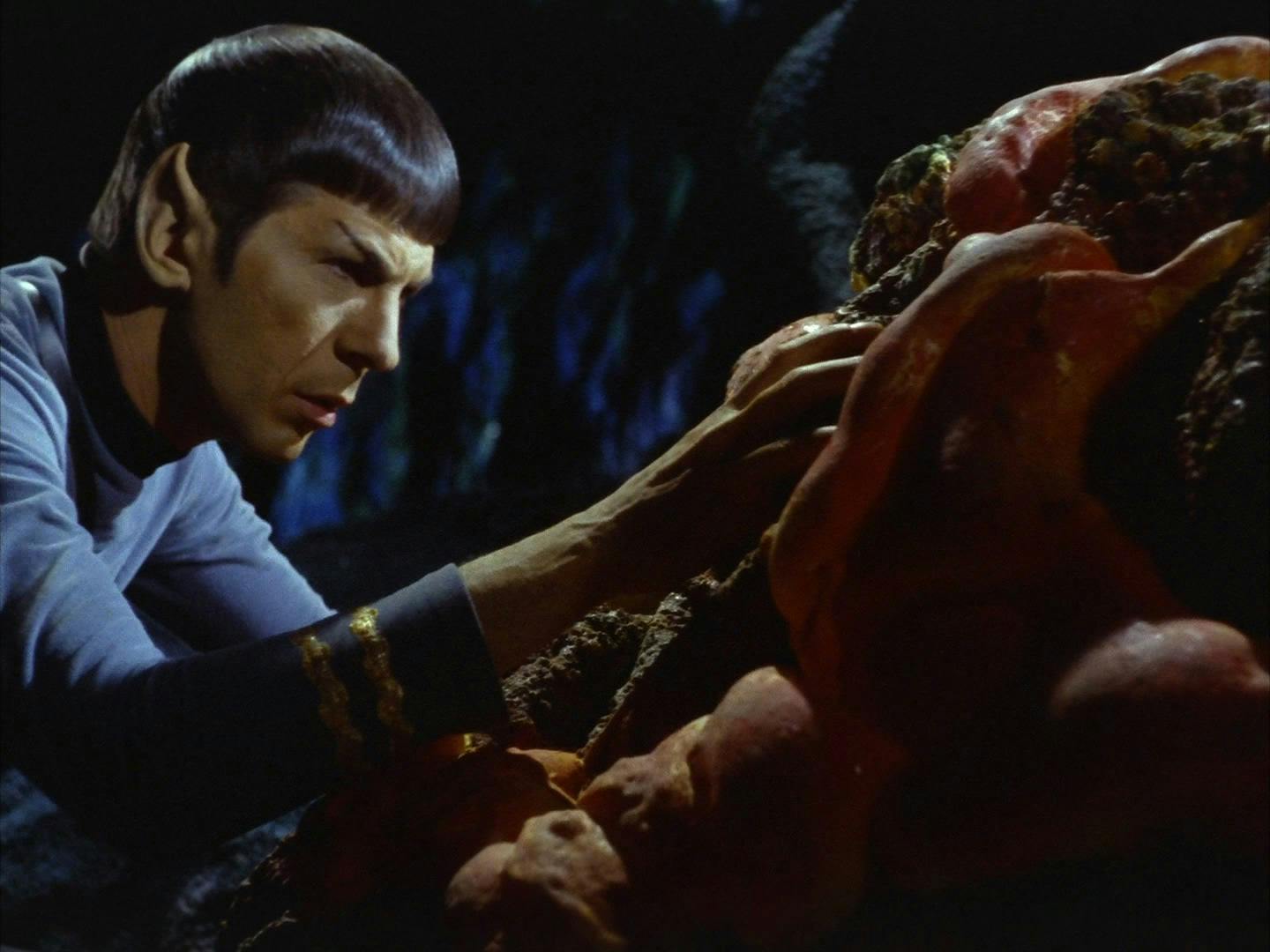Spock mind melds with the Horta.