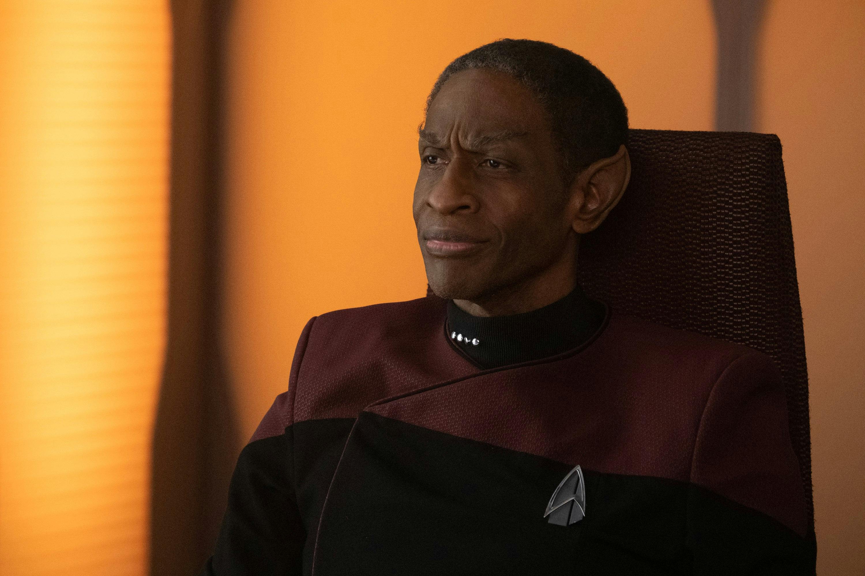 Close-up of Tuvok looking ahead of him while seated in 'The Last Generation'