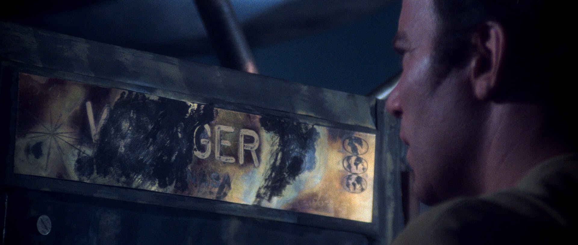 Kirk gazes upon V'Ger's Voyager placard in Star Trek: The Motion Picture