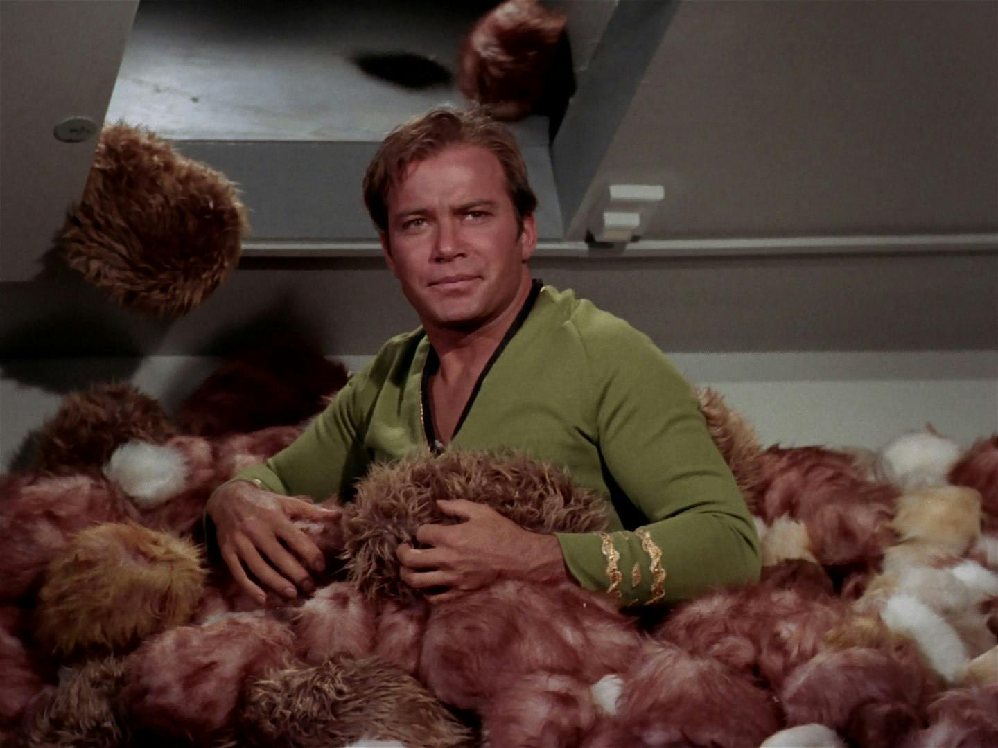 Kirk waist deep in a pile of tribbles on Deep Space Station K-7 in 'The Trouble with Tribbles'