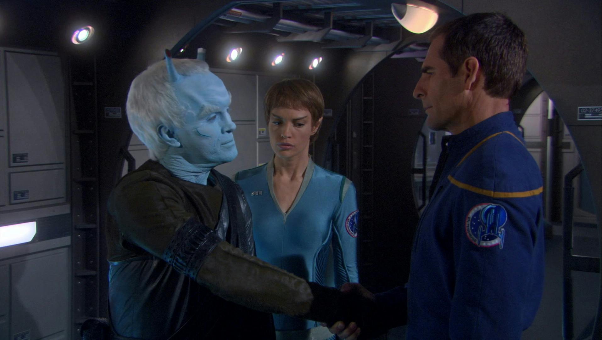 T'Pol is suspicious as Shran takes Archer's hand for a shake in 'The Aenar'