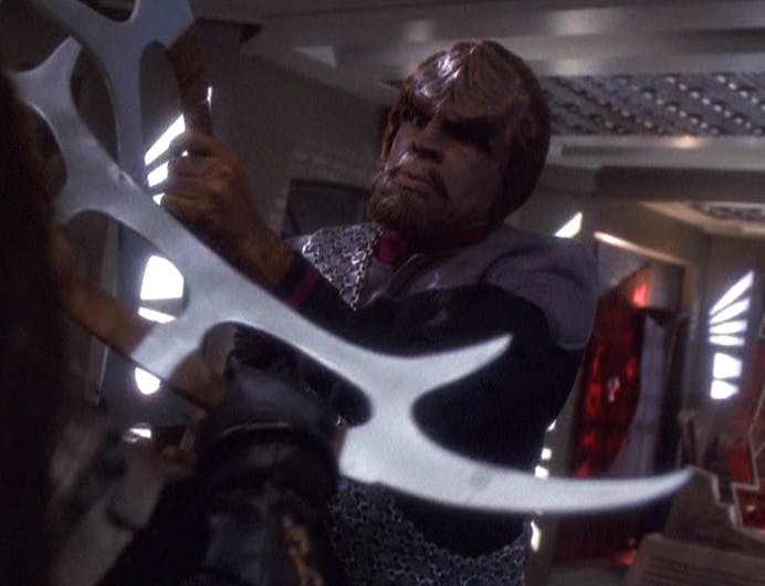 Worf challenges Goworn as they battle with bat'leths in 'Tacking Into the Wind'