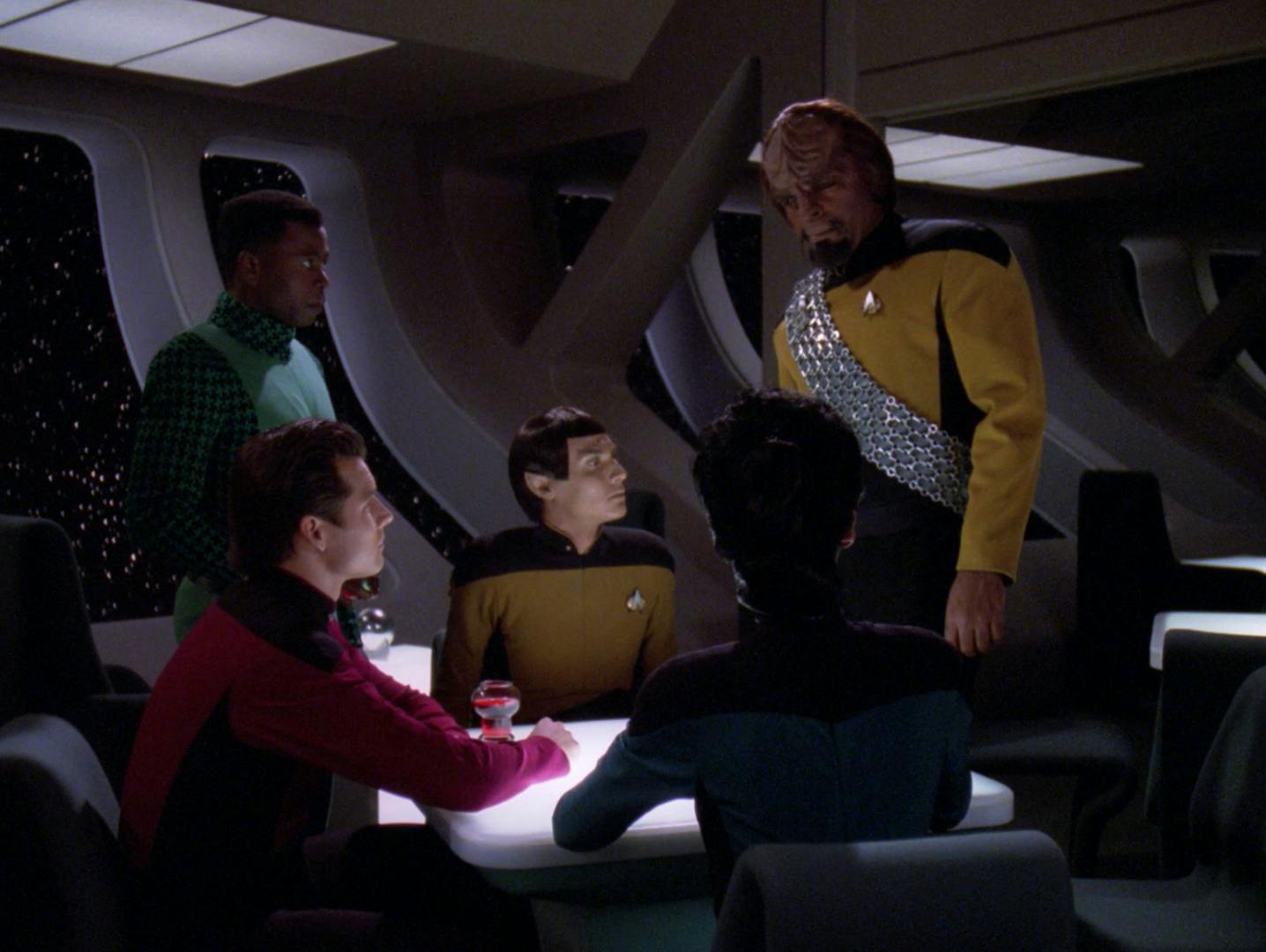 Worf goes beyond his comfort zone as he converses with the Enterprise-D's junior officers in 10 Forward in 'Lower Decks'