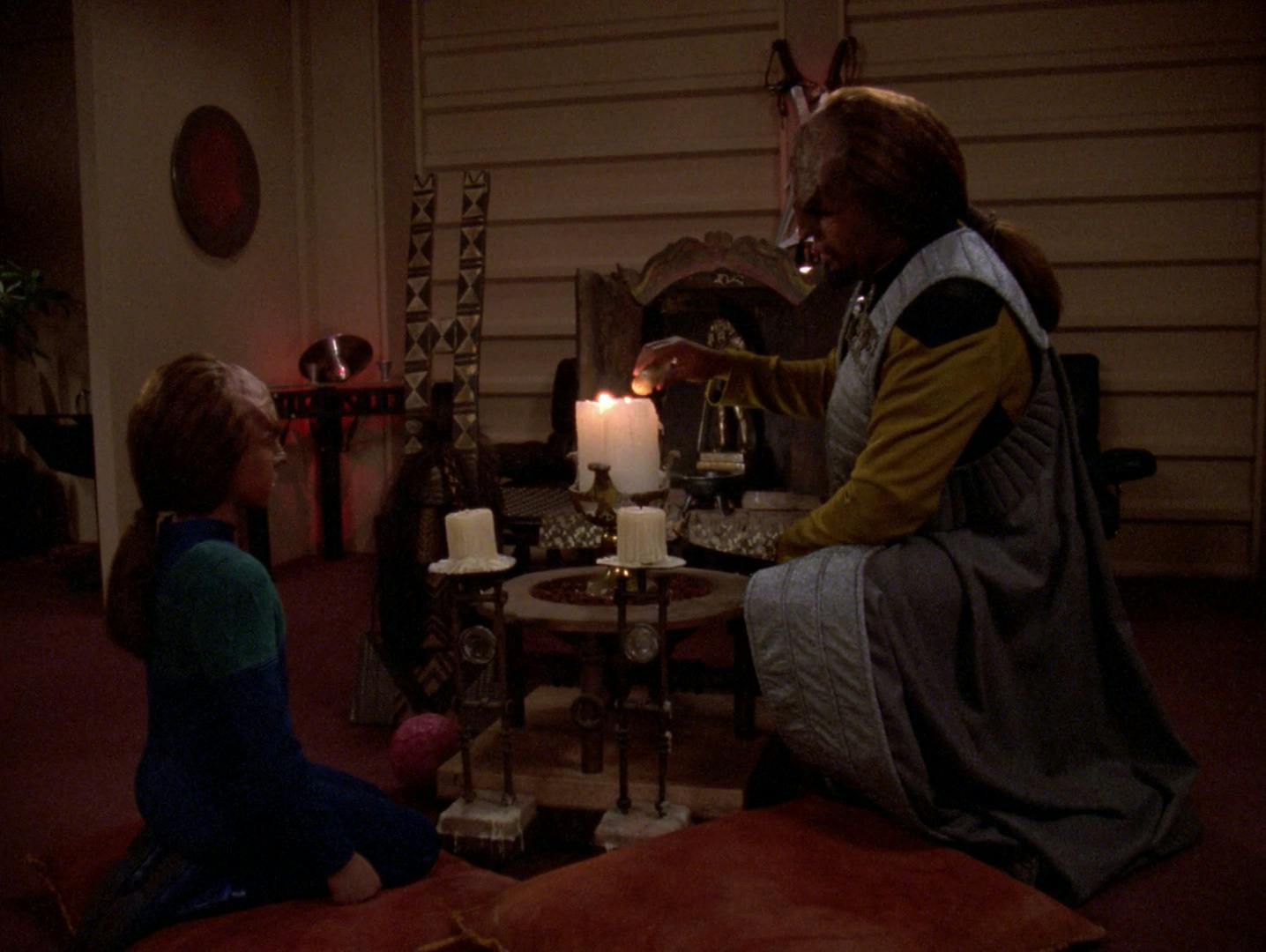 Worf sits with his son Alexander in his quarters to teach him his values of culture and family in 'Firstborn'