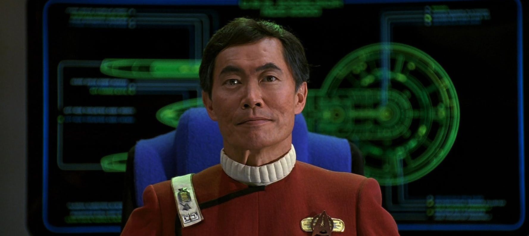 Captain Sulu sits in command of the  U.S.S. Excelsior in Star Trek VI: The Undiscovered Country