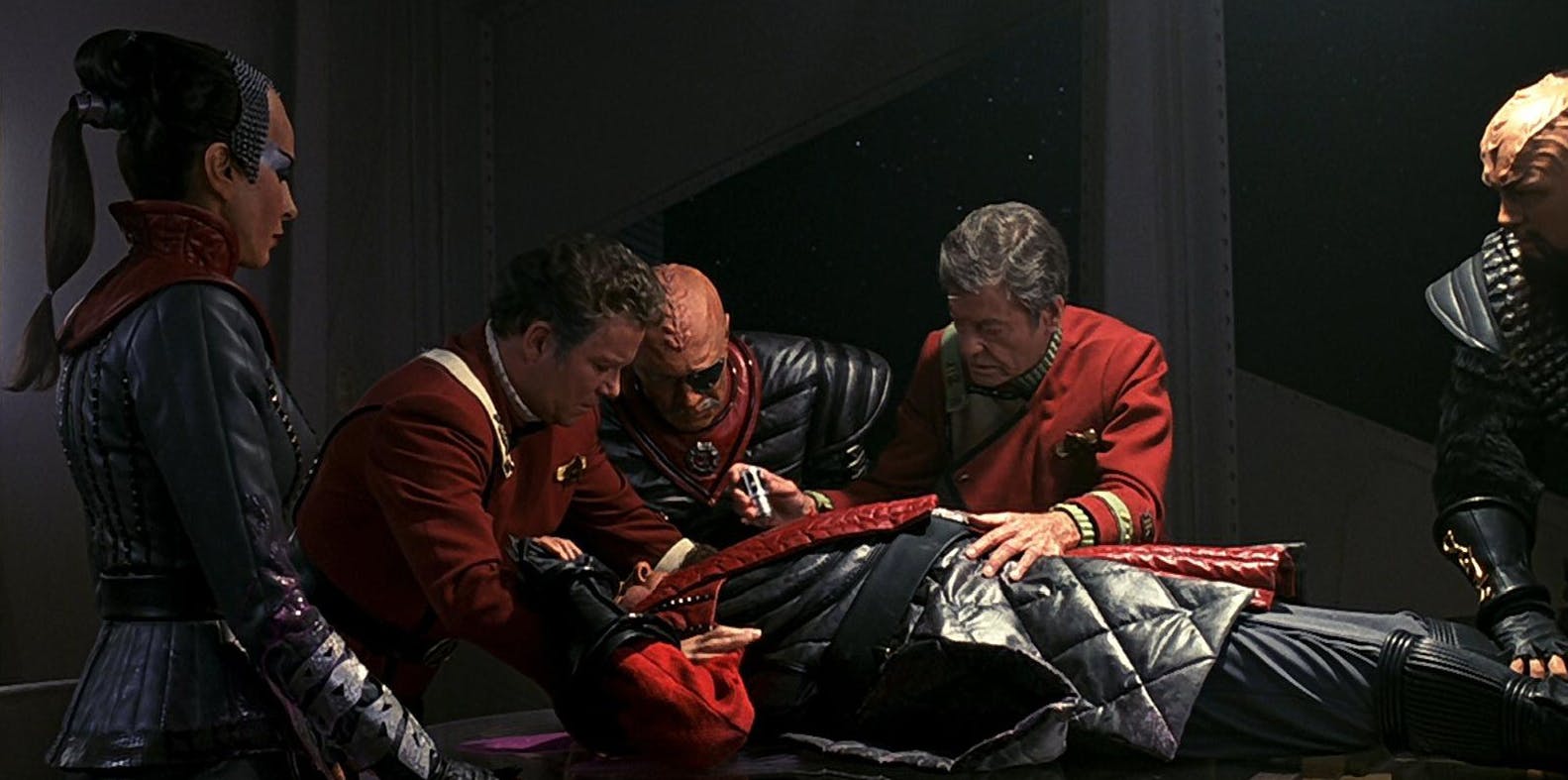 Kirk, Chang, and McCoy surround a wounded Gorkon in Star Trek VI: The Undiscovered Country