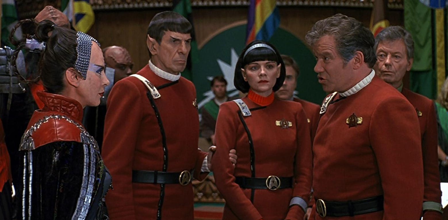 Kirk and Azetbur demonstrate their openness to improvement as Spock and Valeris witness the exchange in Star Trek VI: The Undiscovered Country