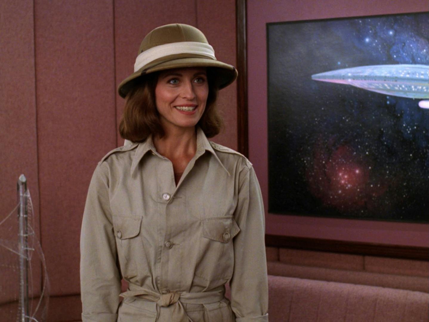 In Picard's Ready Room, Vash appears dressed for a safari adventure with Q in 'Qpid'