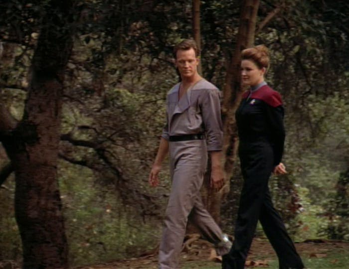 Tom Paris and Captain Janeway take a stroll in the woods of a penal colony in 'Caretaker'