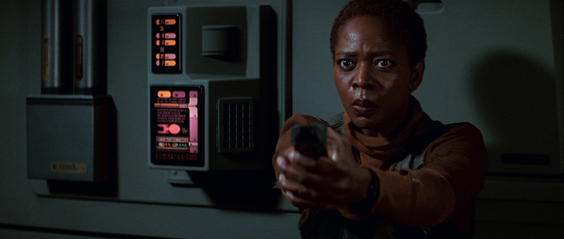 Aboard the Enterprise-E, Lily Sloane holds the phaser steady and refuses to back down in Star Trek: First Contact