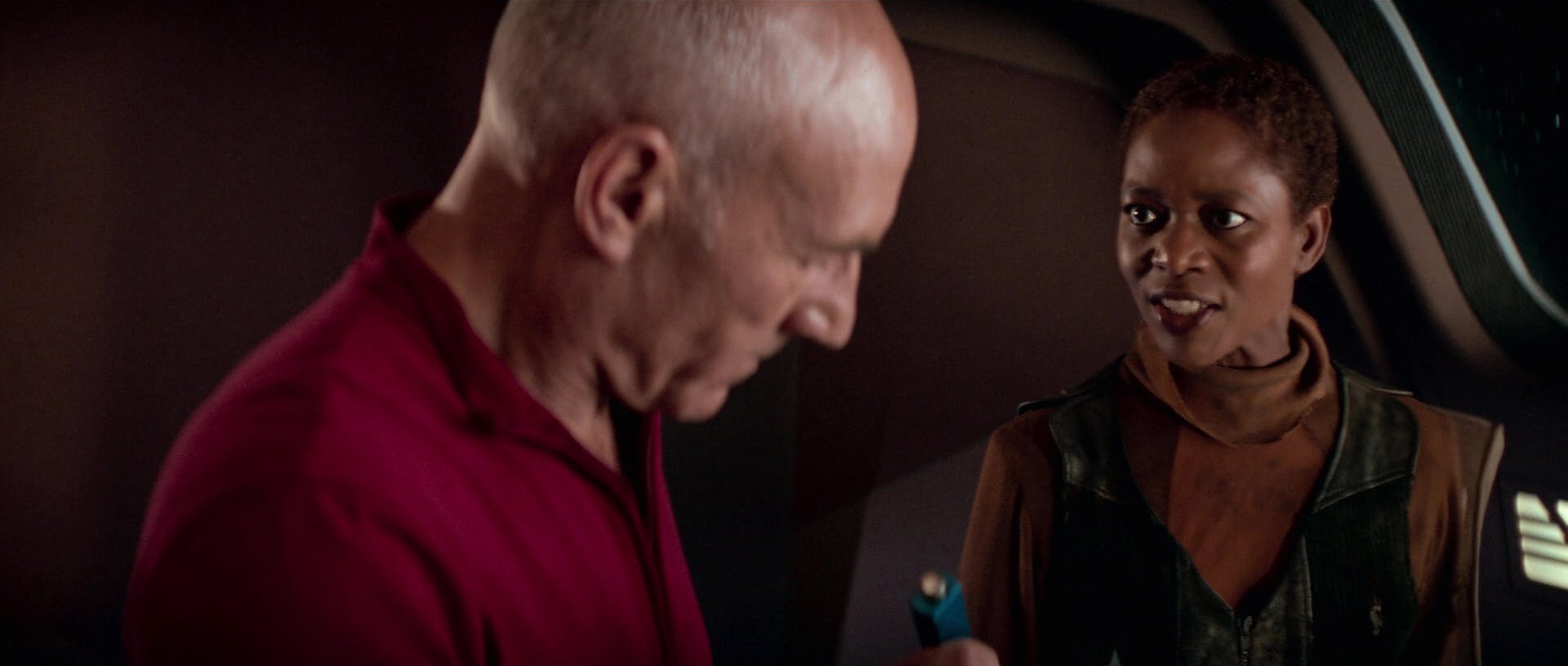 Lily Sloane confronts Picard in the Enterprise-E's Observation Lounge in Star Trek: First Contact