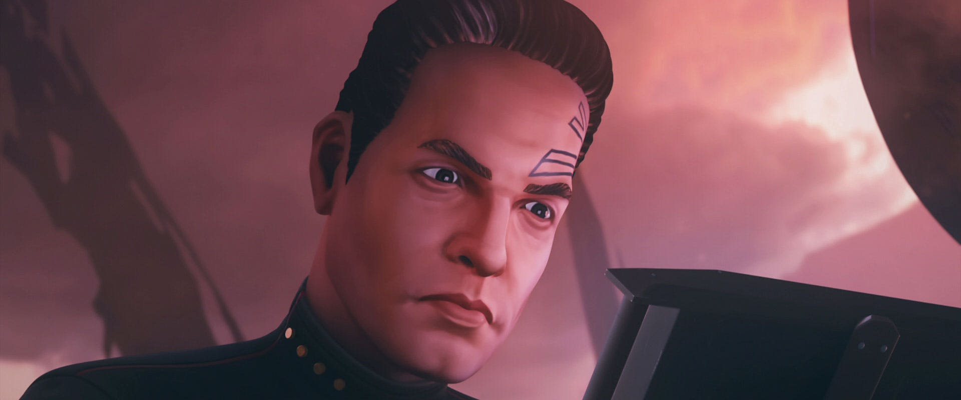 Close-up of Captain Chakotay as he looks at a monitor in 'Preludes'