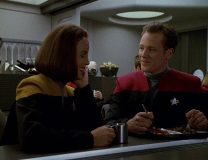 B'Elanna Torres and Tom Paris enjoying each other's company in Voyager's mess hall in 'Real Life'