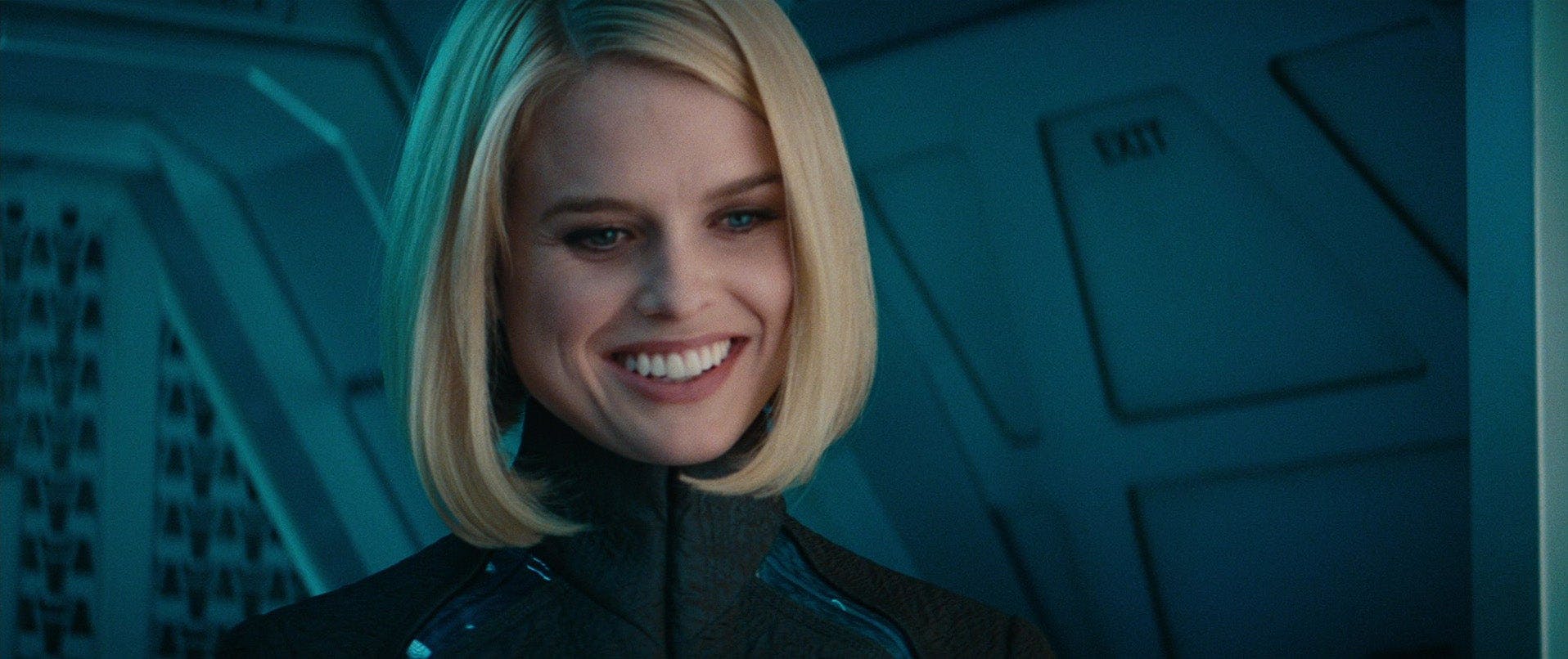 Carol Marcus smiles with her head tilted downward on Star Trek Into Darkness