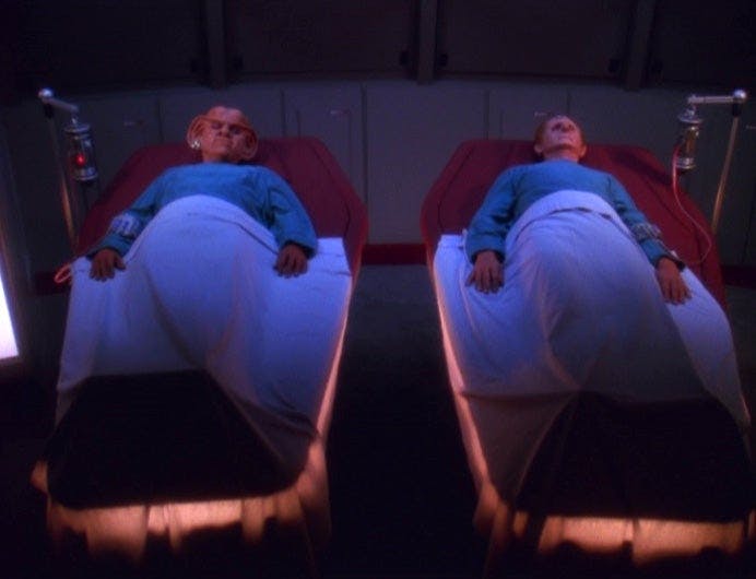 Quark and Odo rest in Sickbay on Star Trek: Deep Space Nine