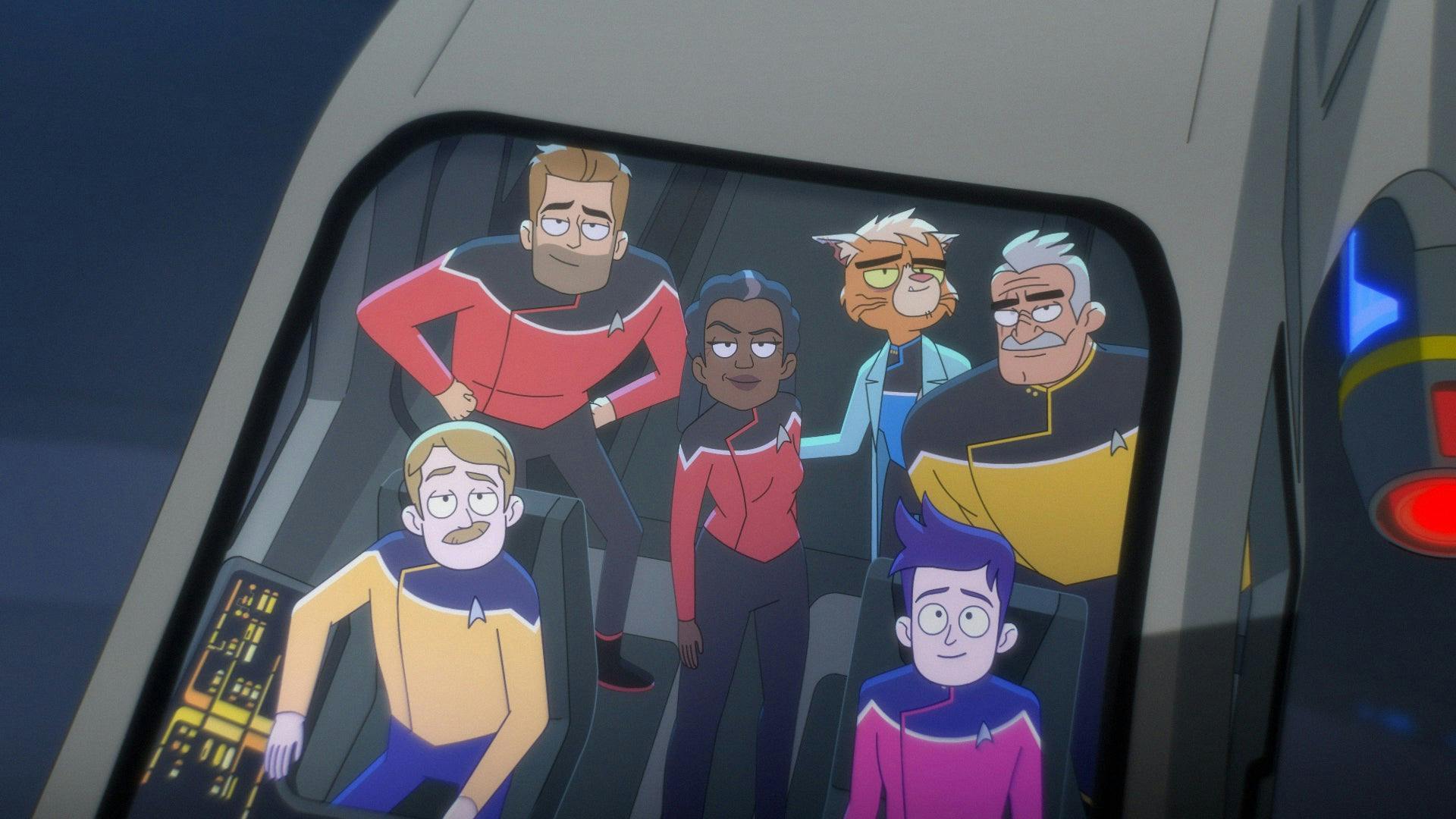 The senior officer of the Cerritos (Billups, Ransom, Freeman, T'Ana, and Shaxs) and Ensign Boimler look up out of their shuttle's viewscreen in 'Crisis Point'