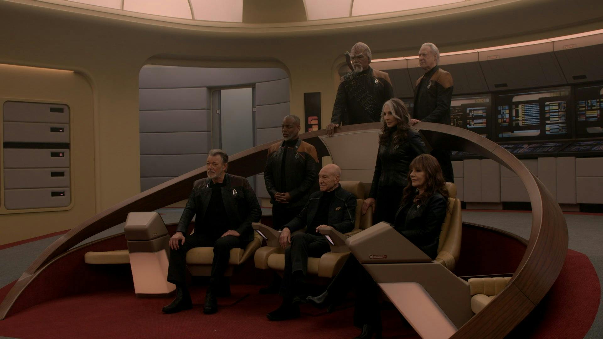 Side angle of The Next Generation crew aboard the reconstructed Enterprise-D for Star Trek: Picard
