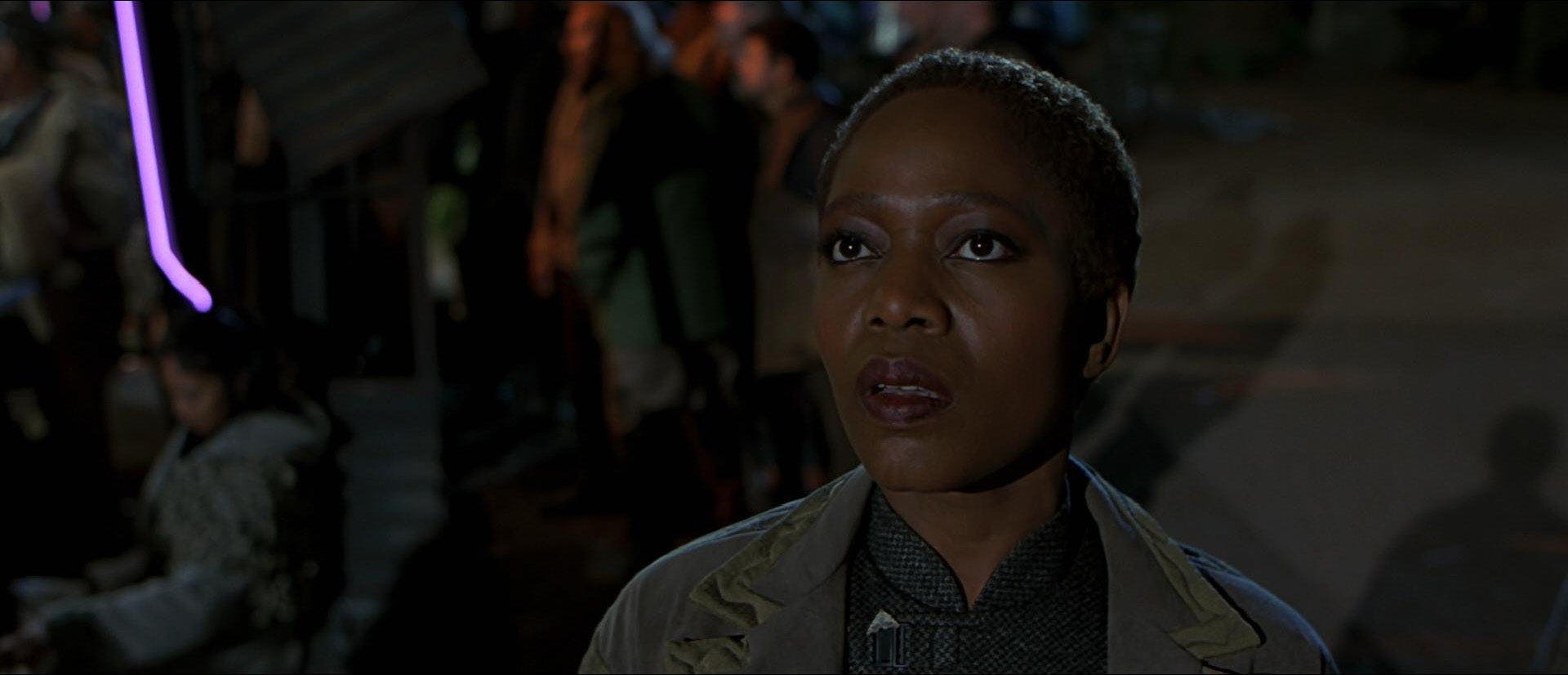 Close-up of Lily Sloane on the surface of Earth in Bozeman as she looks up to the sky in Star Trek: First Contact