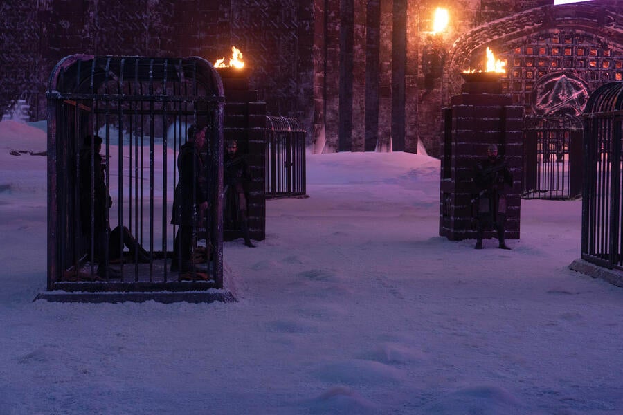 Outside of the Palace Kalar, with the Starfleet emblem on the castle gate, are several cages, with Pike, La'An, and M'Benga locked in one in 'Among the Lotus Eaters'