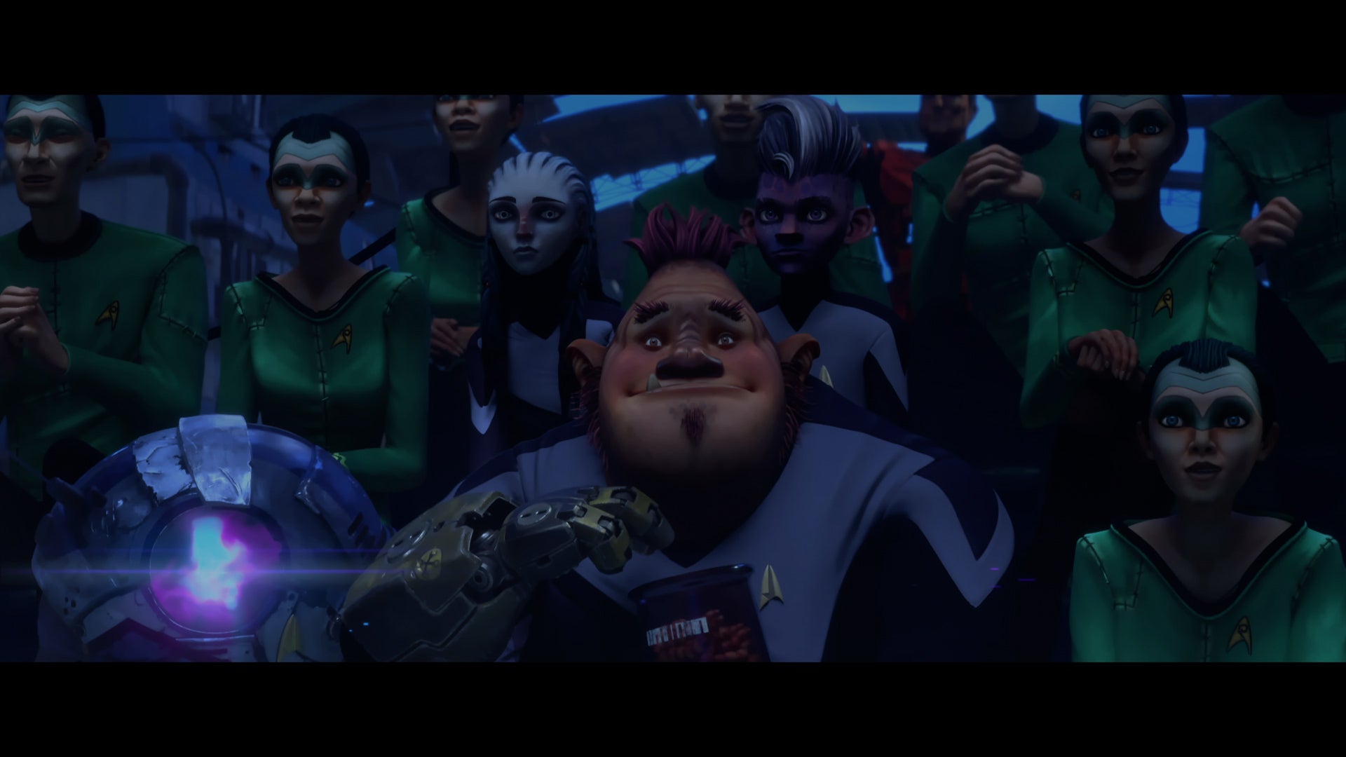 Zero, Jankom Pog, Gwyn, and Dal sit among the Enderprizians taking in a performance on Star Trek: Prodigy