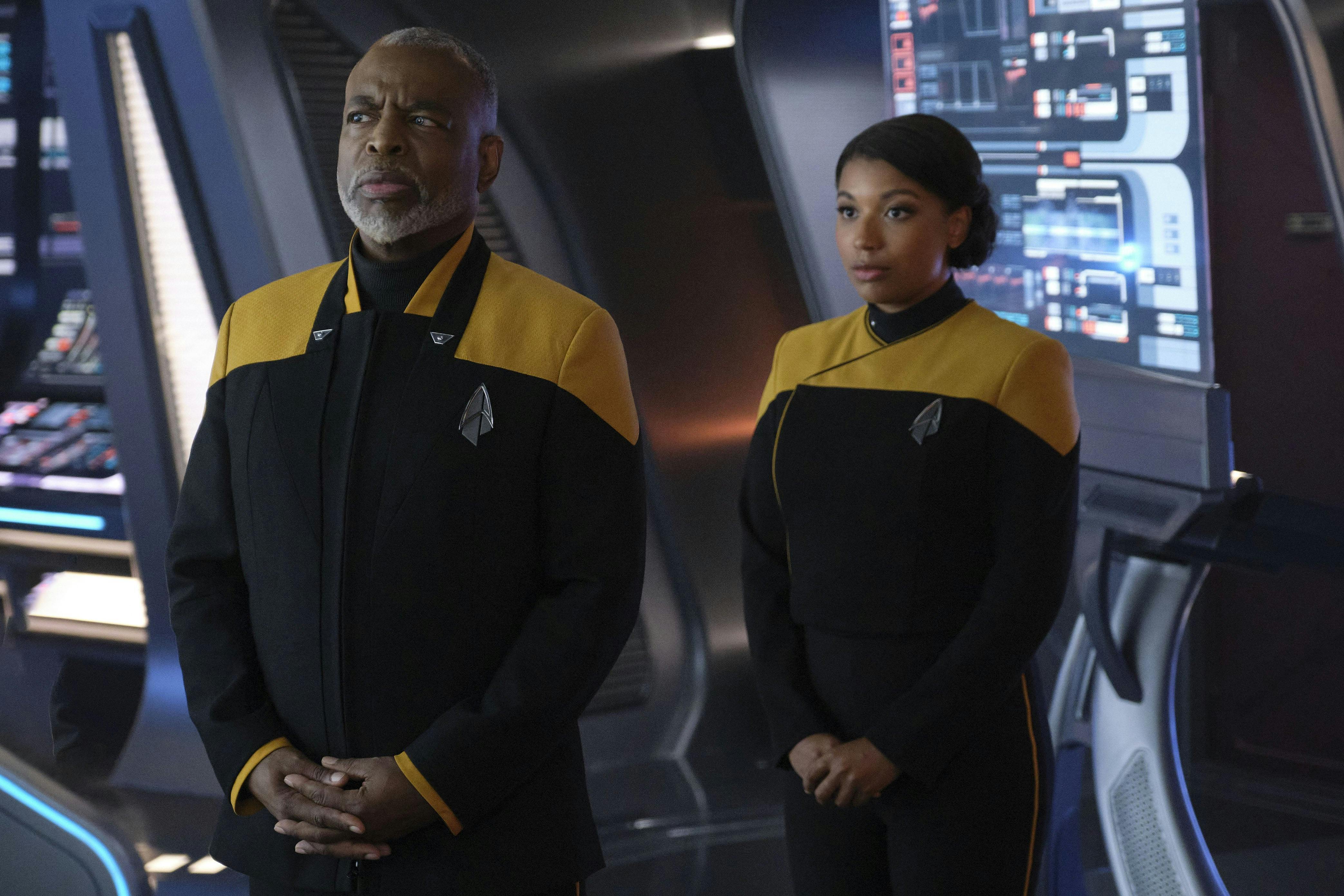 Commodore Geordi La Forge boards the Titan-A, as his daughter stands behind him, and meets Captain Shaw in 'The Bounty'