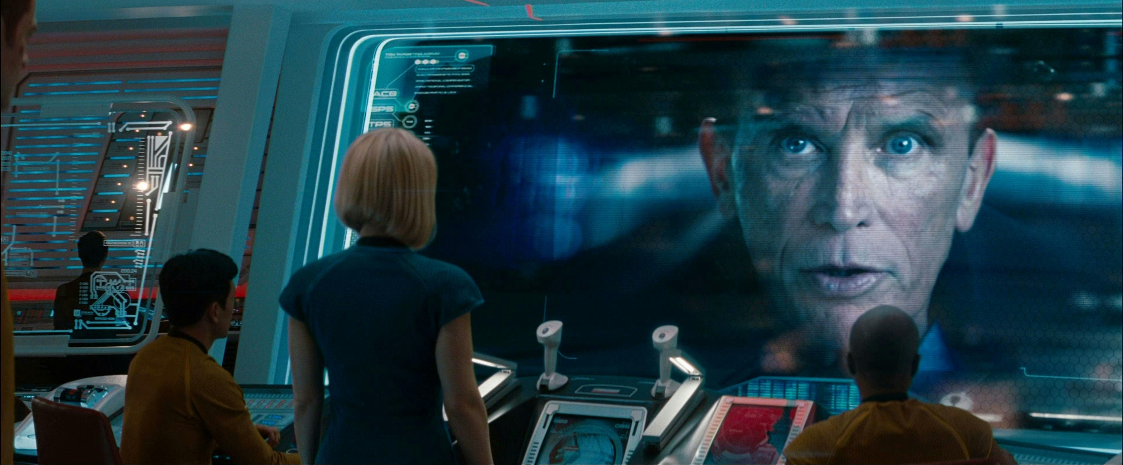 Sulu and Carol Marcus address Admiral Marcus who appears on the viewscreen of the U.S.S. Enterprise in Star Trek Into Darkness