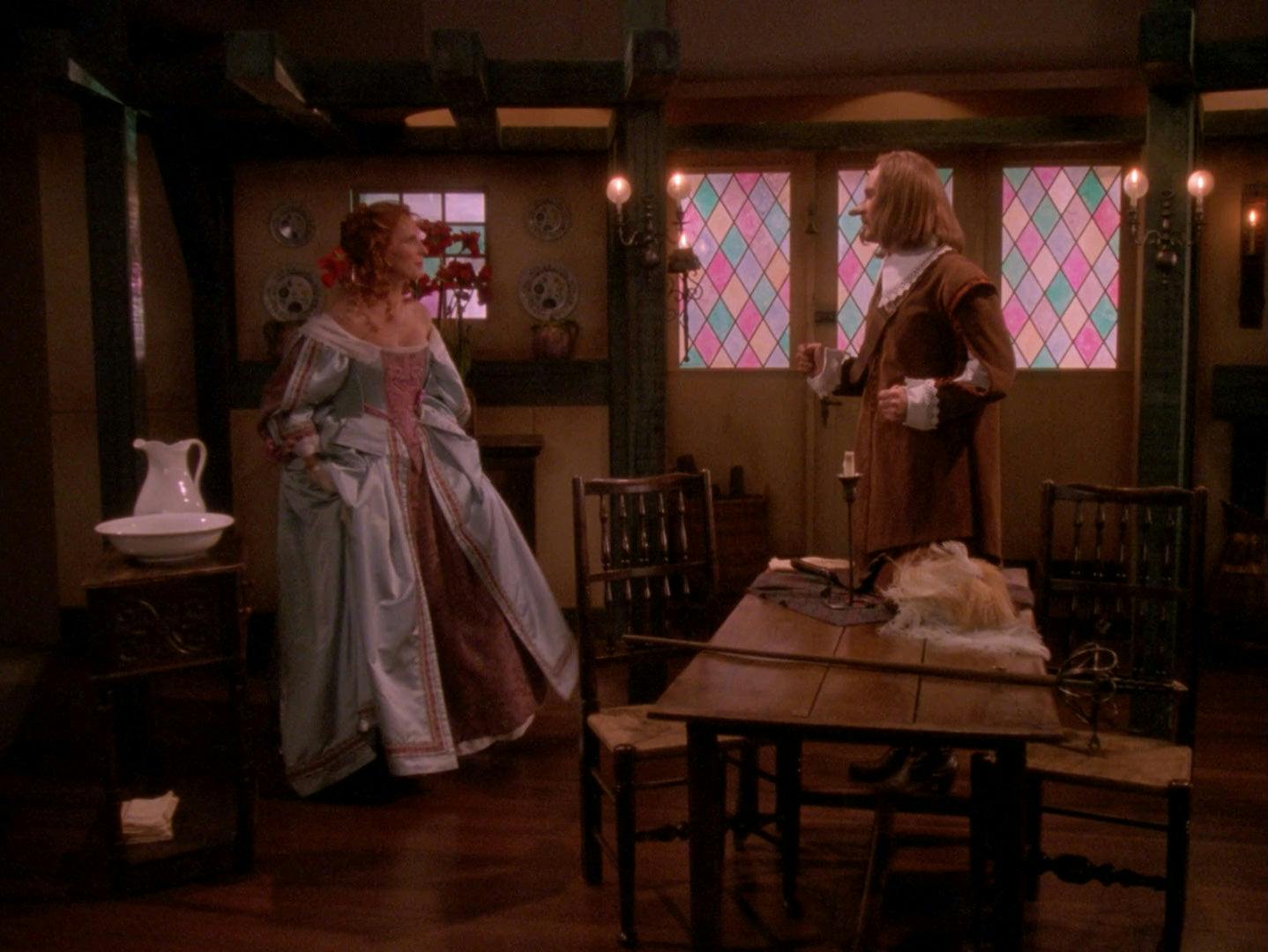 Dr. Crusher and Lt. Barclay perform a scene from Cyrano.