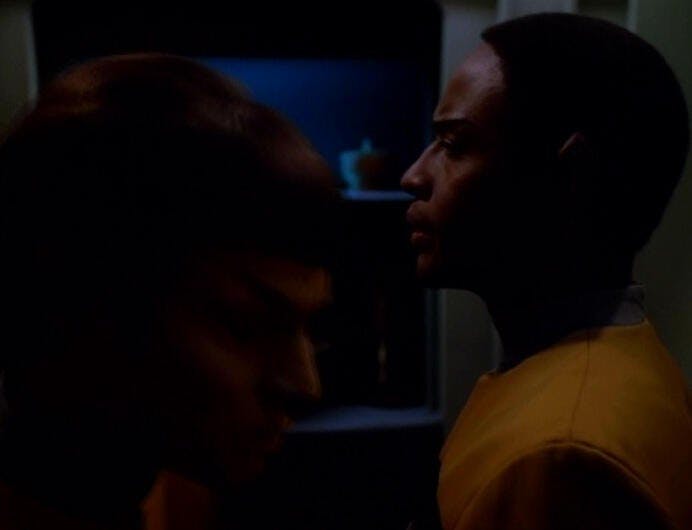 Vorik and Tuvok stand side by side, facing opposite directions, and avoiding eye contact in 'Blood Fever'